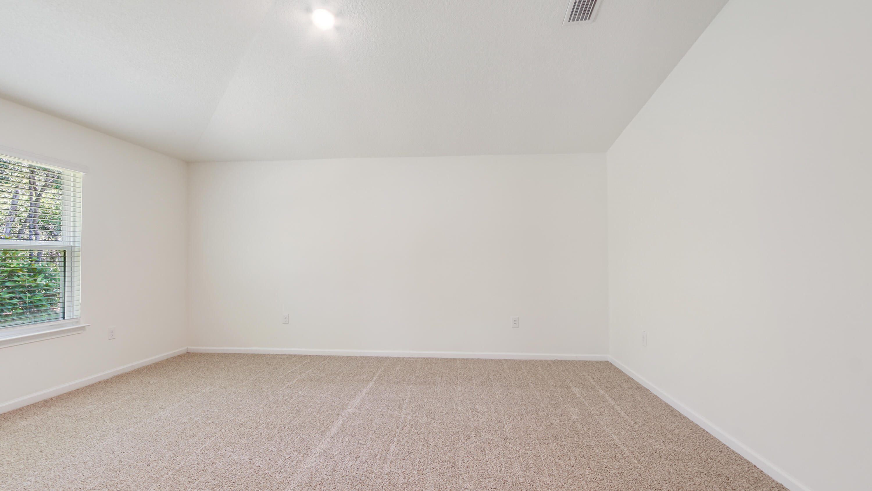 720 Riverwalk Circle Freeport, FL 32439 - Photo 32 of 50 a view of an empty room and a window