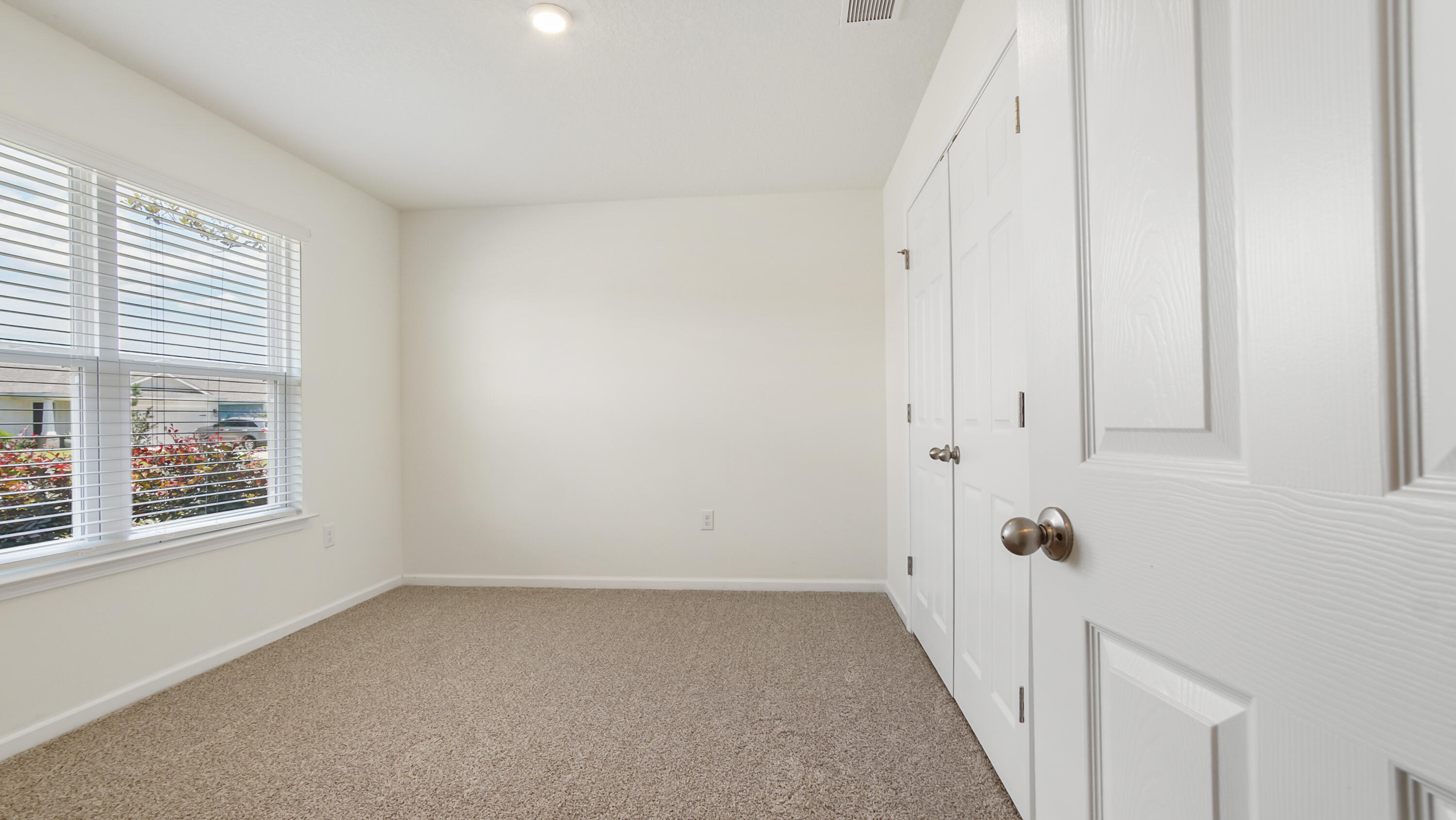 720 Riverwalk Circle Freeport, FL 32439 - Photo 10 of 50 a view of a hallway with windows