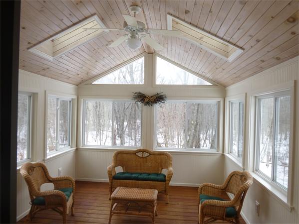 795 Liberty Square Road Boxborough, MA 01719 - Photo 11 of 20 a living room with furniture and a large window