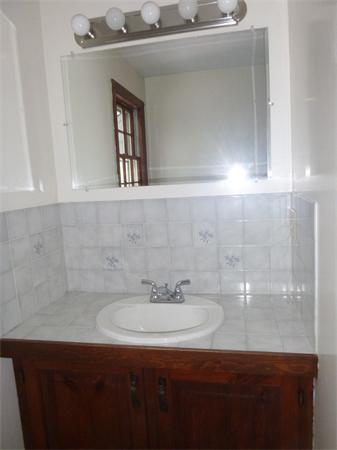 795 Liberty Square Road Boxborough, MA 01719 - Photo 15 of 20 a bathroom with a sink and a mirror