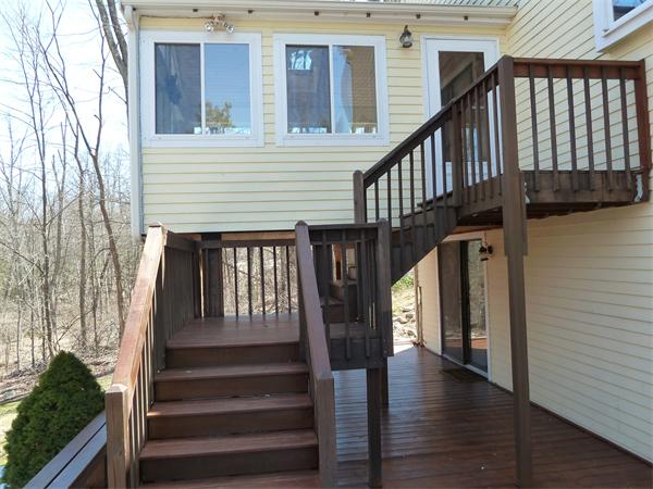 795 Liberty Square Road Boxborough, MA 01719 - Photo 16 of 20 a view of entryway with wooden floor and stairs