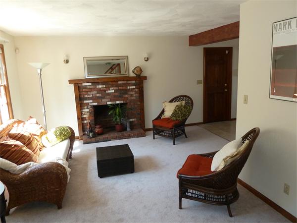 795 Liberty Square Road Boxborough, MA 01719 - Photo 3 of 20 a living room with furniture and a fireplace