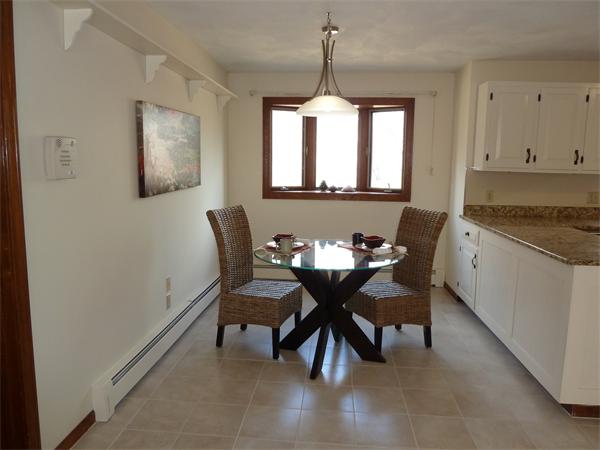 795 Liberty Square Road Boxborough, MA 01719 - Photo 8 of 20 a dining room with furniture and window