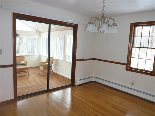 795 Liberty Square Road Boxborough, MA 01719 - Photo 10 of 20 wooden floor in an empty room with a window