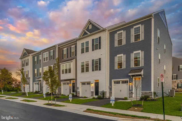 a front view of a building with street view