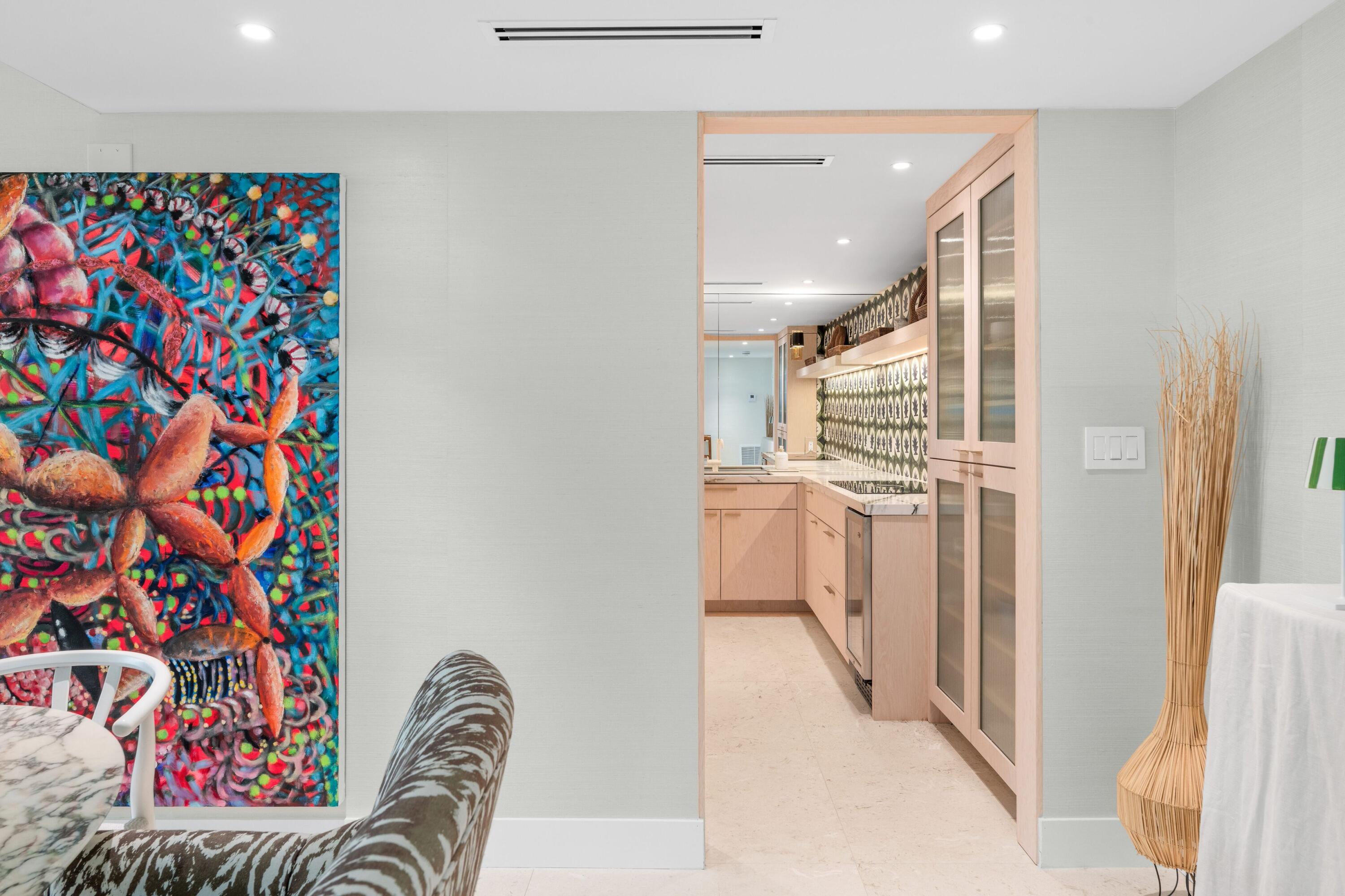2773 South Ocean Boulevard, Unit 209 Palm Beach, FL 33480 - Photo 14 of 30 a kitchen with stainless steel appliances granite countertop a refrigerator and a sink