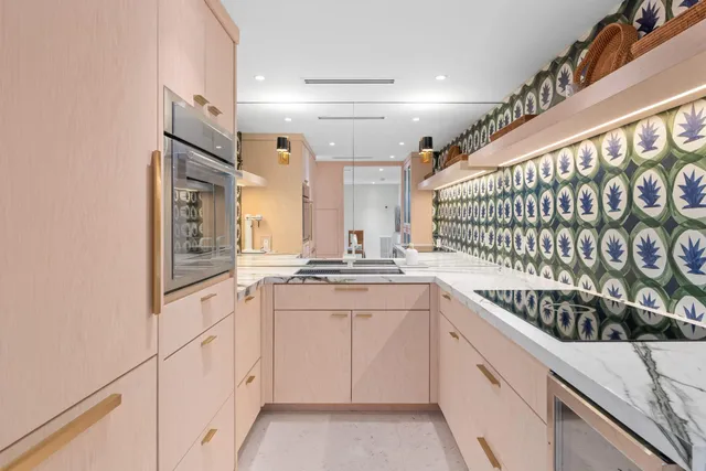 a bedroom with a bed and a table