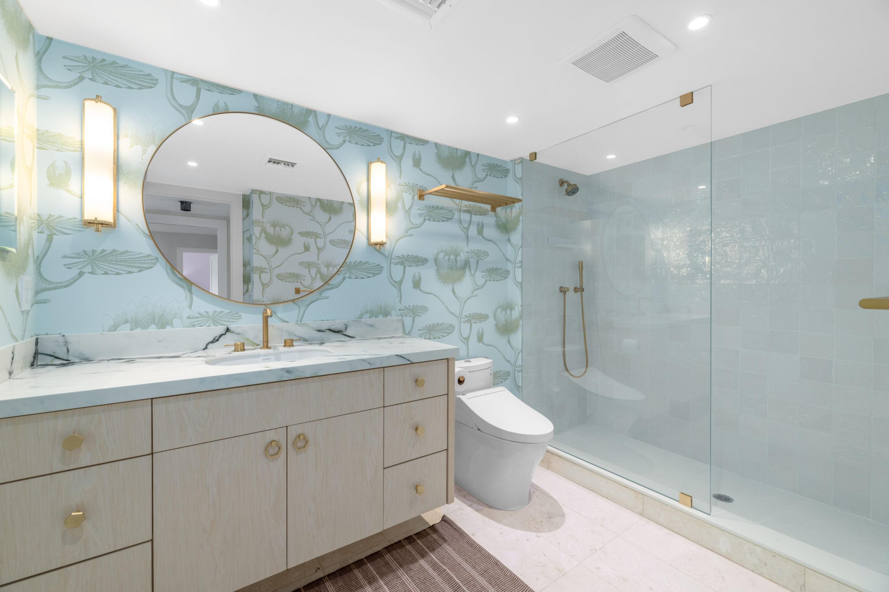 2773 South Ocean Boulevard, Unit 209 Palm Beach, FL 33480 - Photo 19 of 30 a spacious bathroom with a double vanity sink mirror and toilet