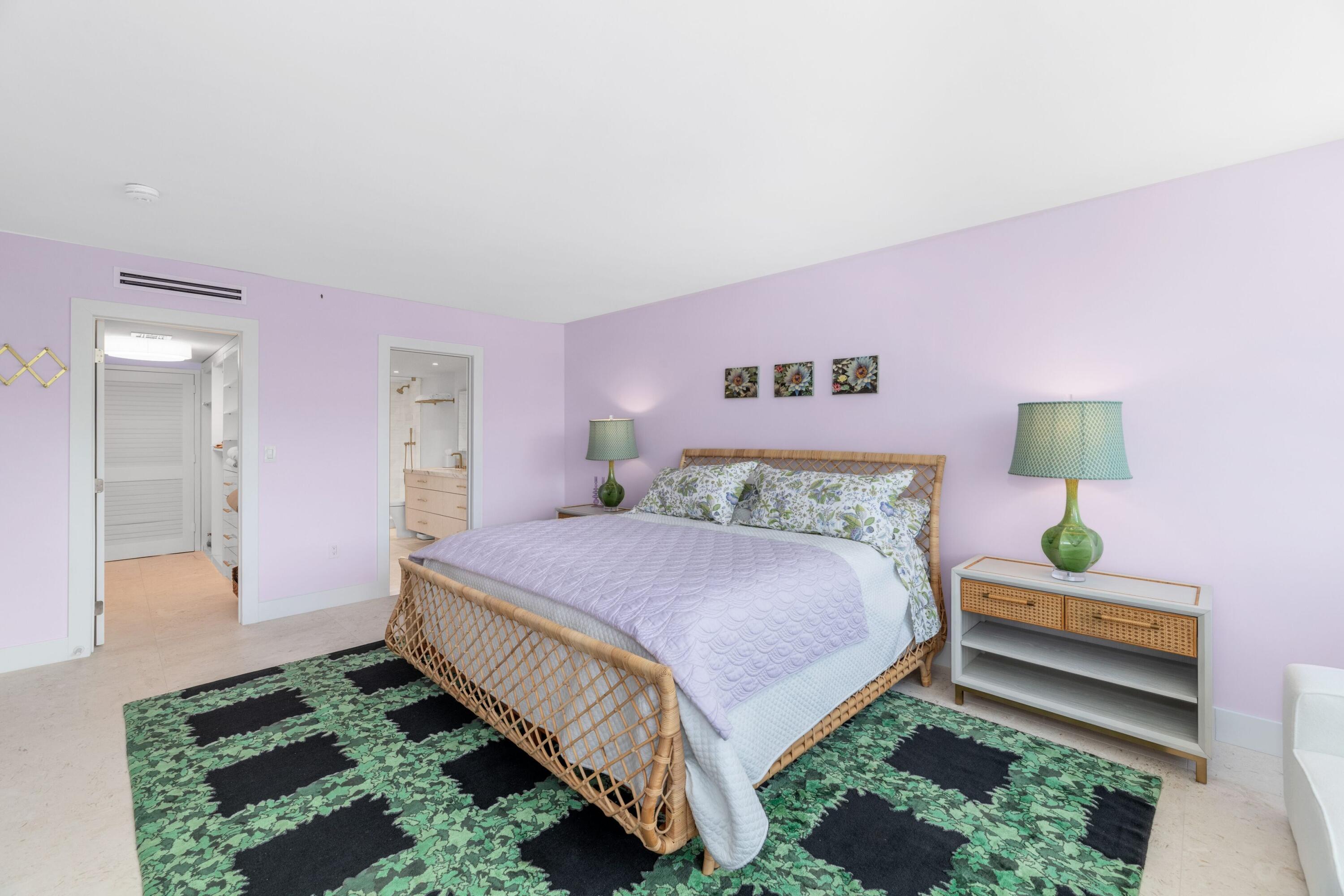 2773 South Ocean Boulevard, Unit 209 Palm Beach, FL 33480 - Photo 22 of 30 a bedroom with bed and a night stand