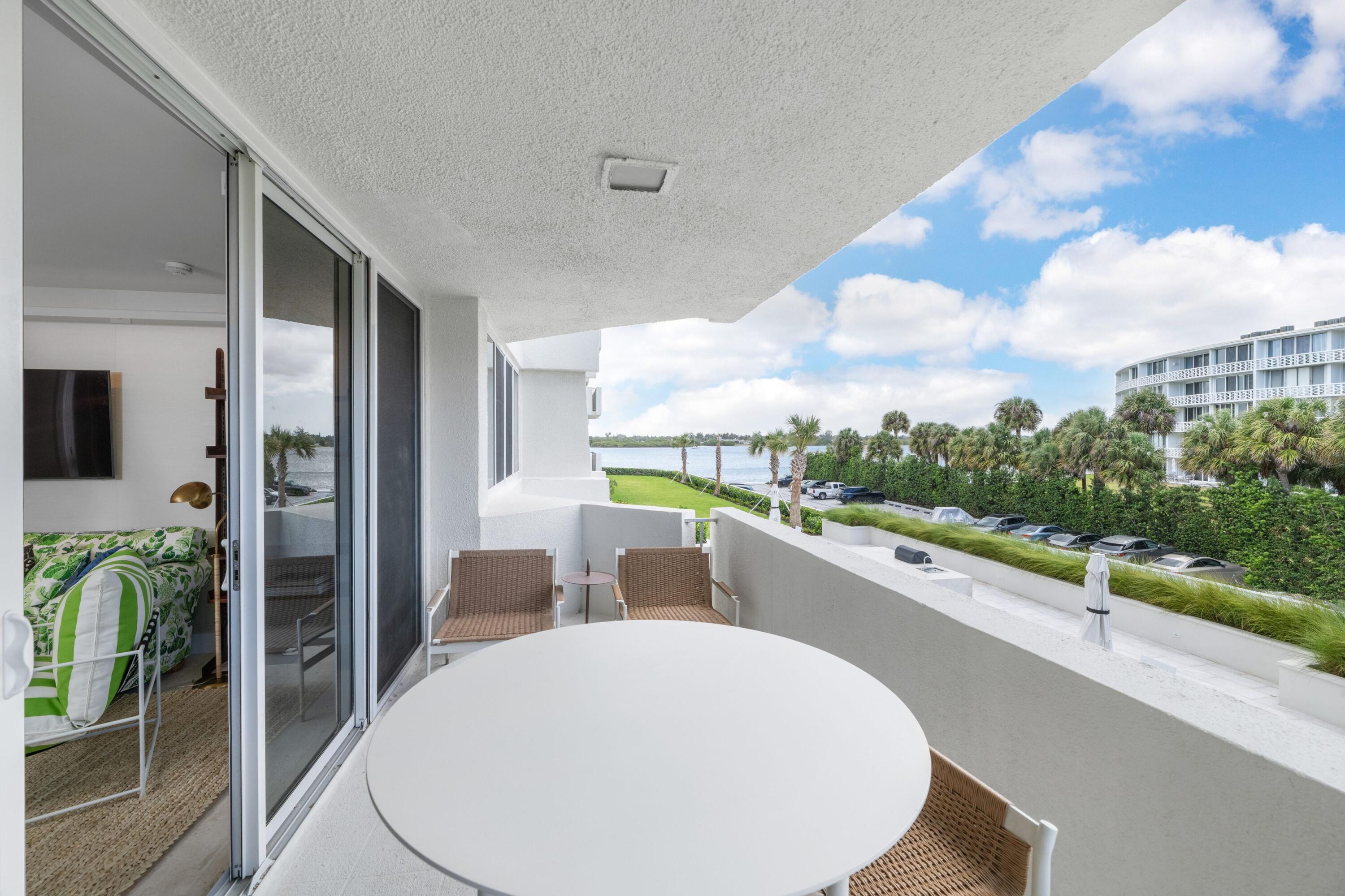 2773 South Ocean Boulevard, Unit 209 Palm Beach, FL 33480 - Photo 26 of 30 a view of a living room and a window