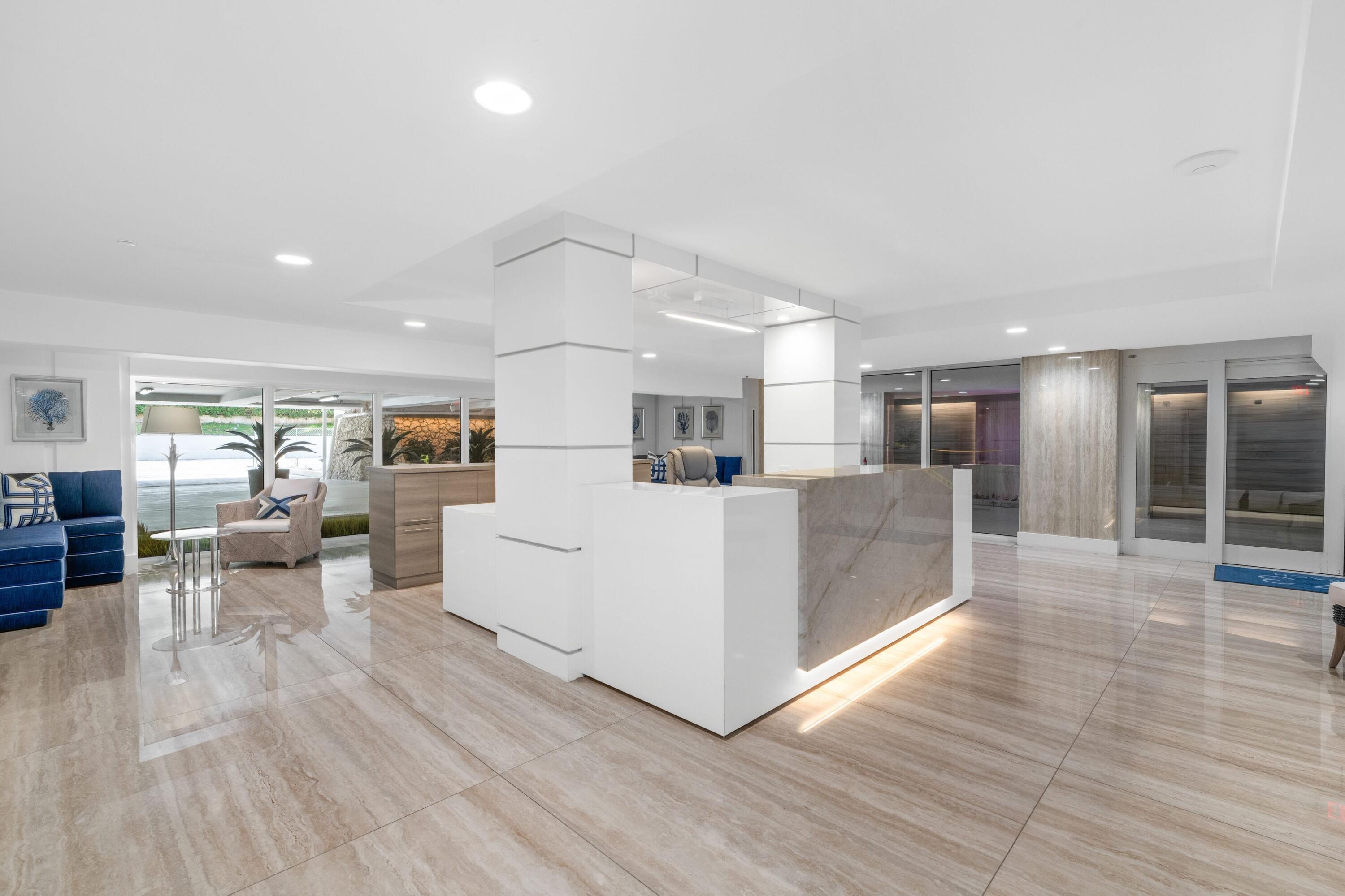 2773 South Ocean Boulevard, Unit 209 Palm Beach, FL 33480 - Photo 27 of 30 a view of a living room kitchen and a wooden floor