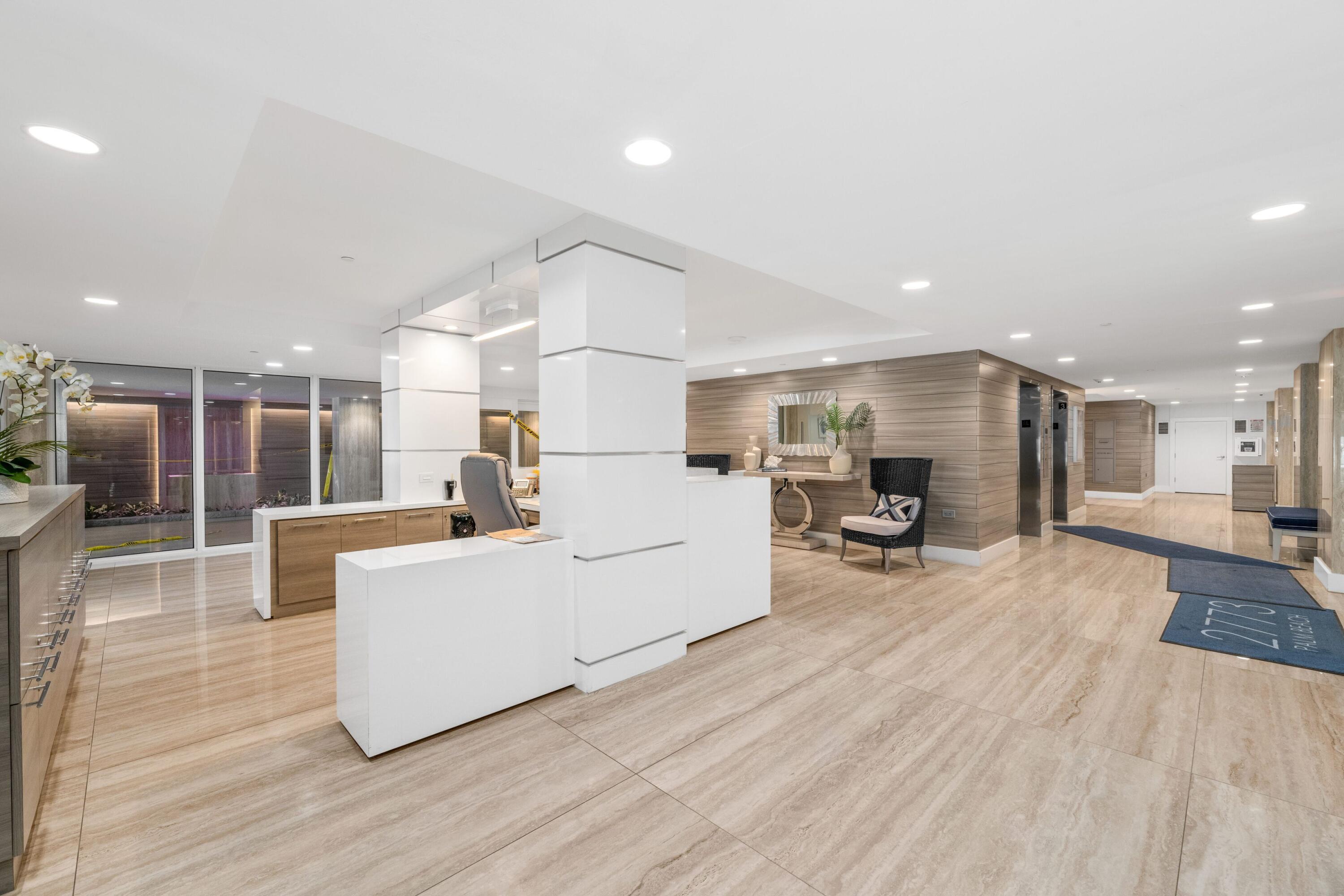 2773 South Ocean Boulevard, Unit 209 Palm Beach, FL 33480 - Photo 28 of 30 a living room with furniture and a table