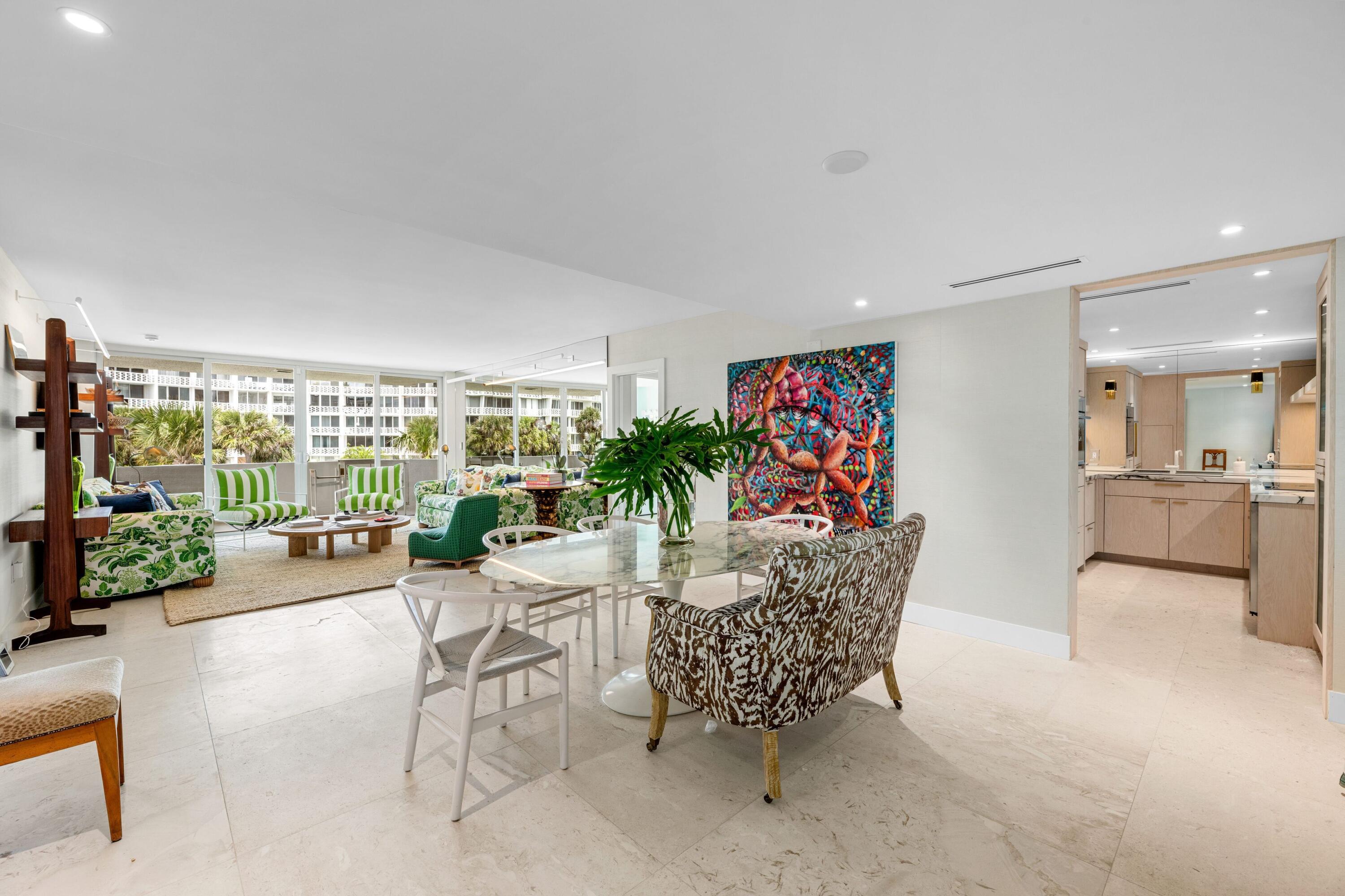 2773 South Ocean Boulevard, Unit 209 Palm Beach, FL 33480 - Photo 5 of 30 a living room with furniture and a potted plant