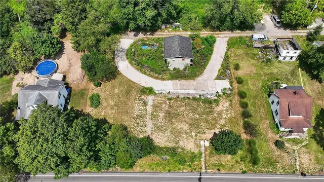 a bird view of building and green space