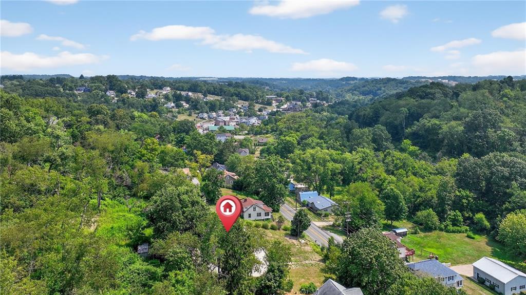 3143 Santiago Road Imperial, PA 15126 - Photo 20 of 24 a view of a lush green field with lots of flower in it