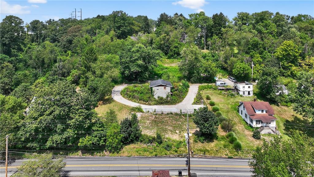 3143 Santiago Road Imperial, PA 15126 - Photo 22 of 24 an aerial view of a house with a yard and outdoor seating