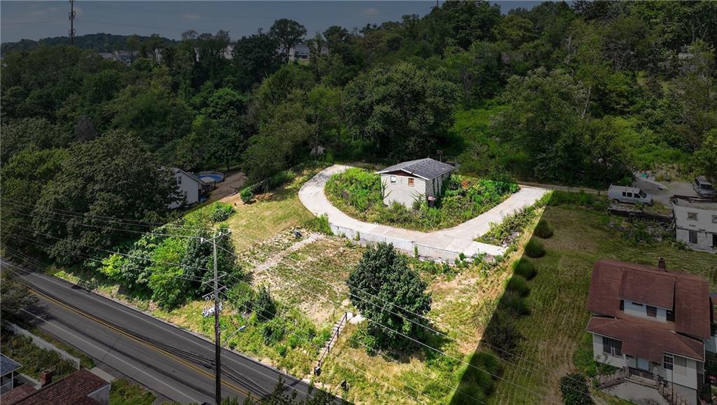 3143 Santiago Road Imperial, PA 15126 - Photo 23 of 24 a view of a small yard with large trees