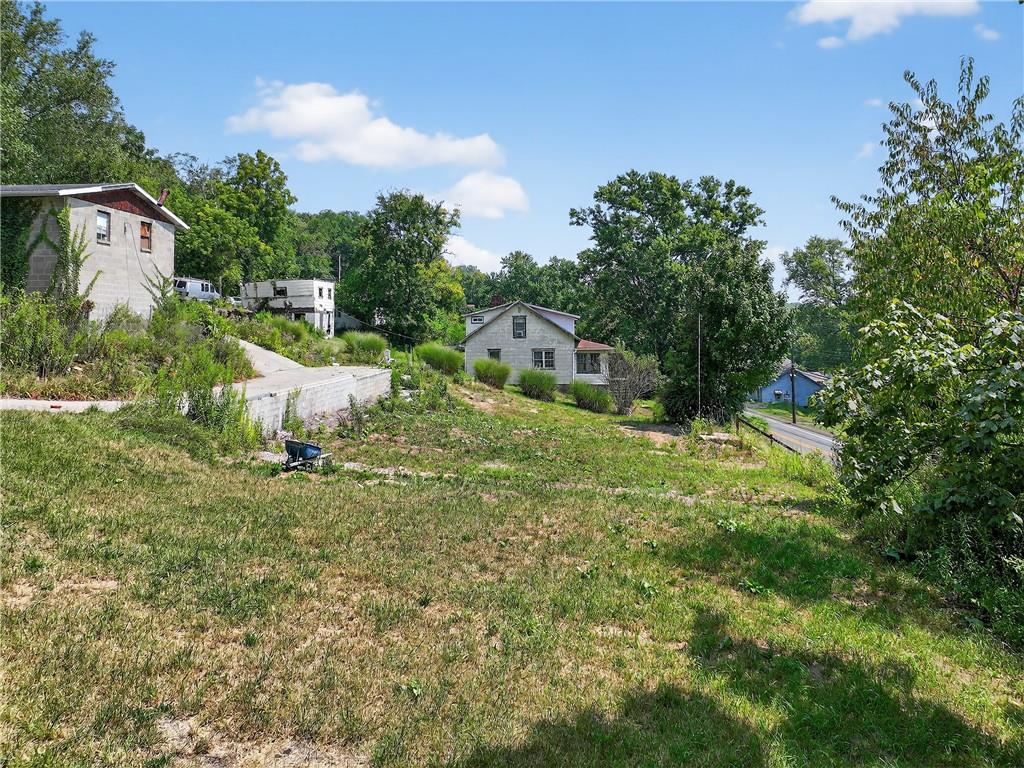 3143 Santiago Road Imperial, PA 15126 - Photo 3 of 24 a view of a house with a yard and sitting area