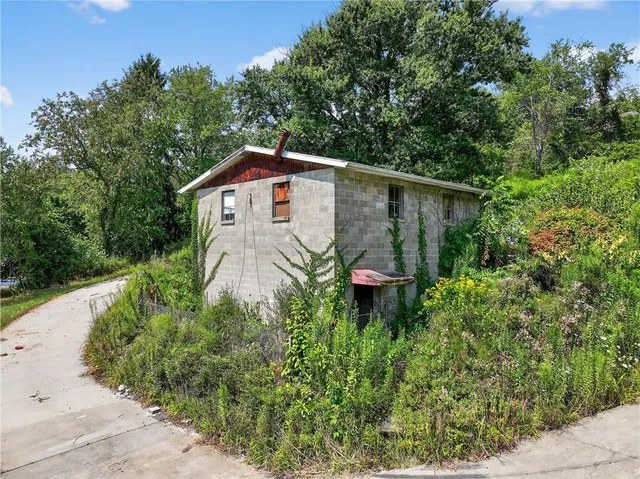 a backyard of a house with lots of green space