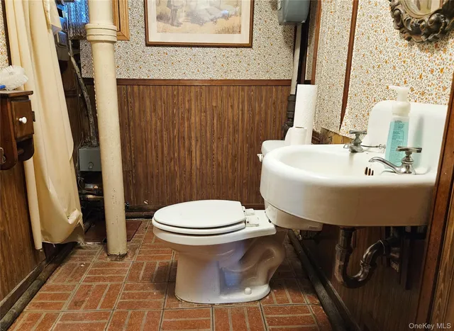a view of deck with wooden floor and trees