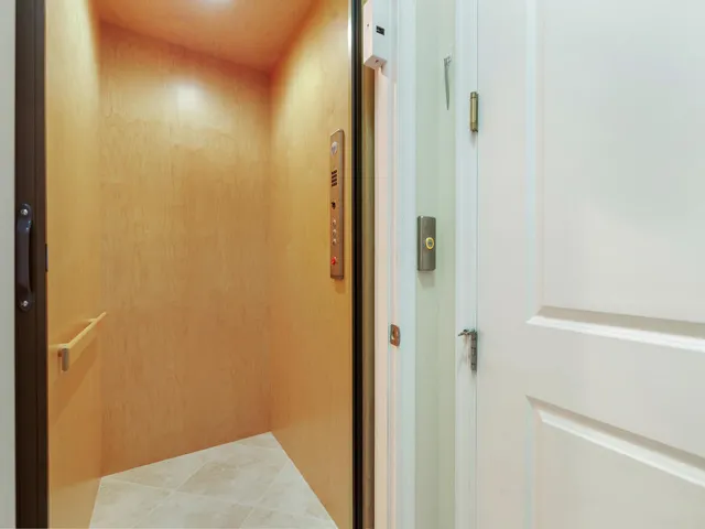 a view of parking garage with cars