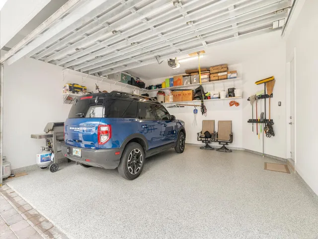 a swimming pool with outdoor seating and yard