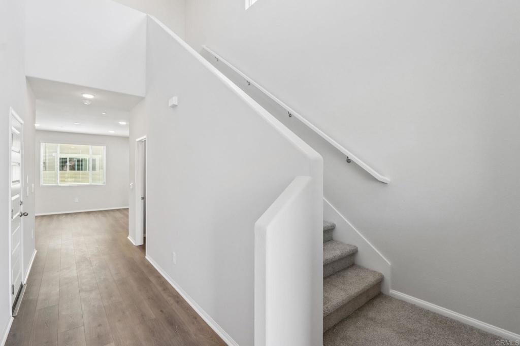 28424 Campos De Flores Temecula, CA 92591 - Photo 16 of 36 a view of entryway with wooden floor