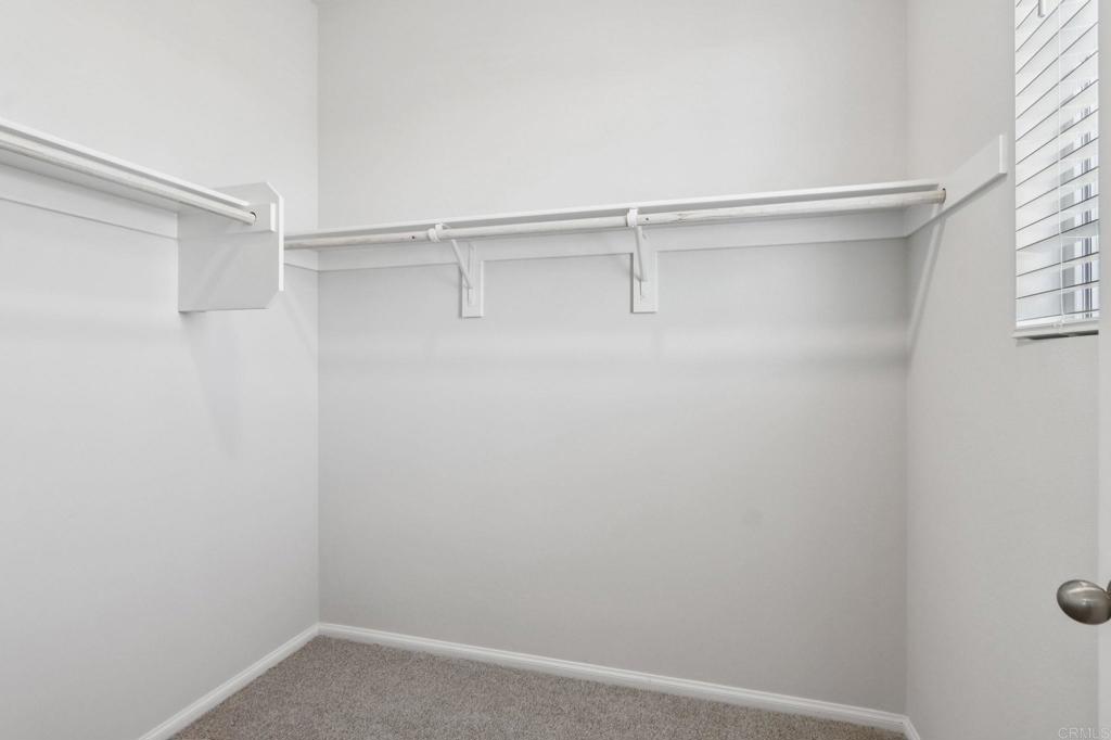 28424 Campos De Flores Temecula, CA 92591 - Photo 20 of 36 a view of an empty walk in closet