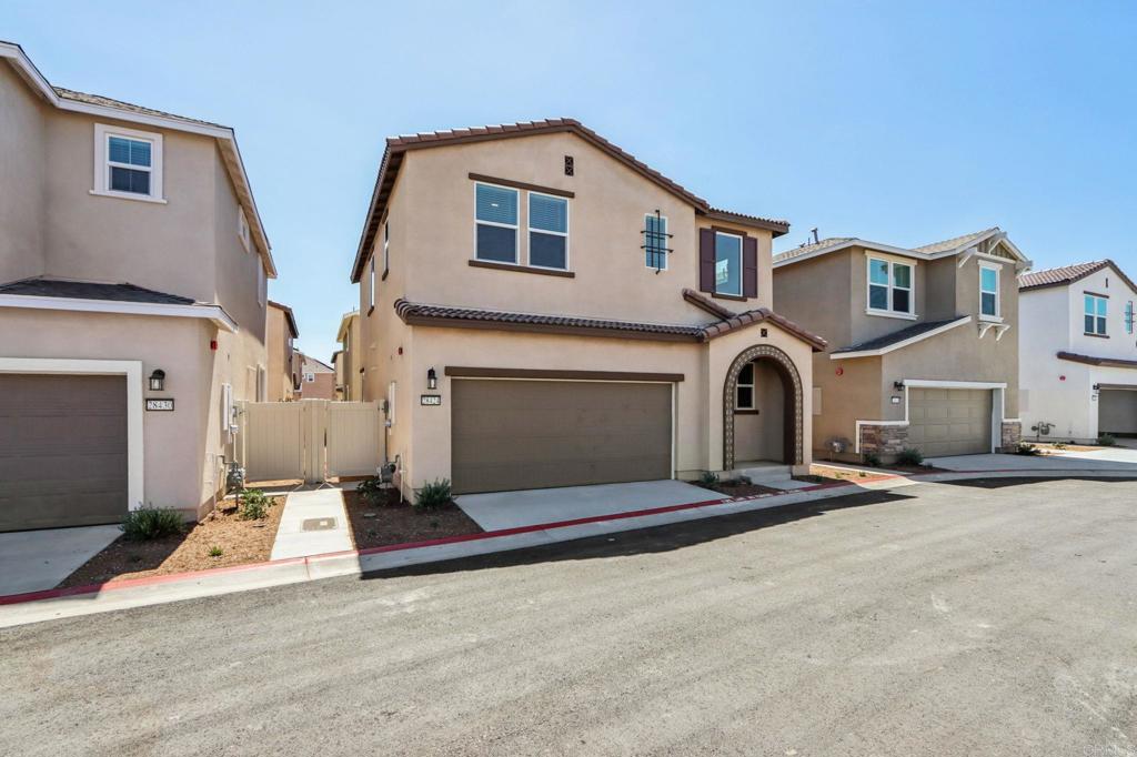 28424 Campos De Flores Temecula, CA 92591 - Photo 2 of 36 a front view of a house with a yard