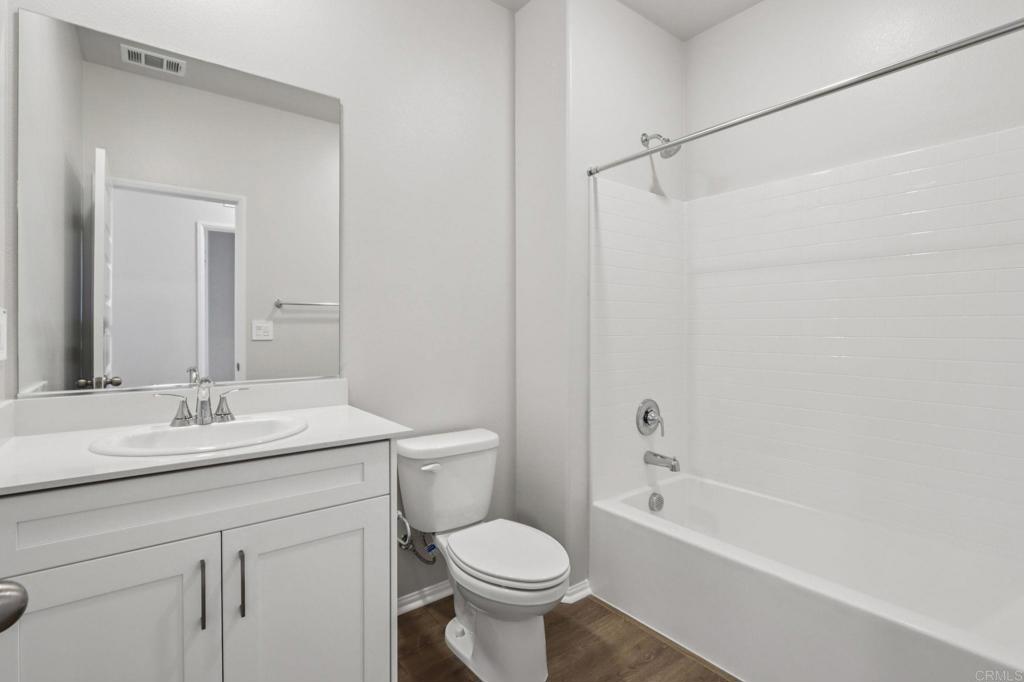 28424 Campos De Flores Temecula, CA 92591 - Photo 21 of 36 a bathroom with a sink toilet and shower