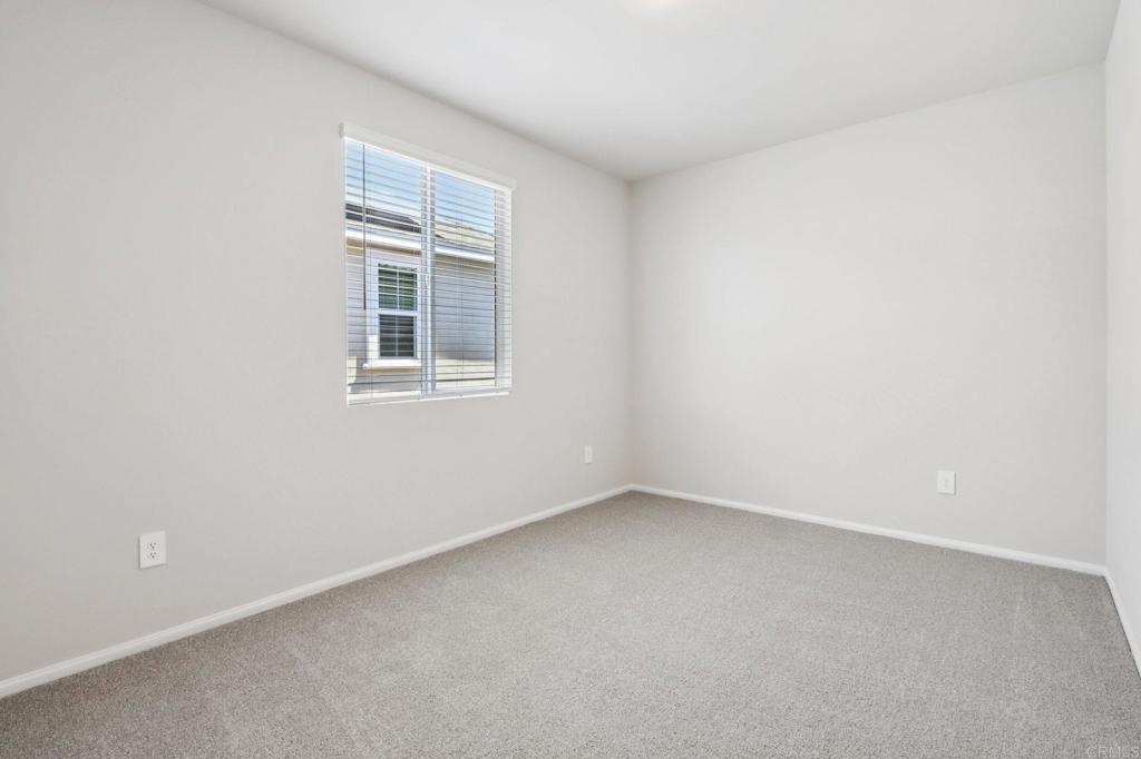 28424 Campos De Flores Temecula, CA 92591 - Photo 22 of 36 an empty room with a window