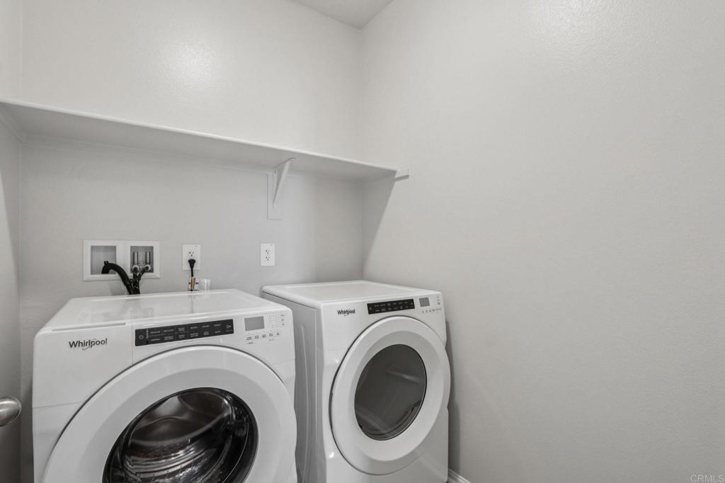 28424 Campos De Flores Temecula, CA 92591 - Photo 24 of 36 a utility room with dryer and washer