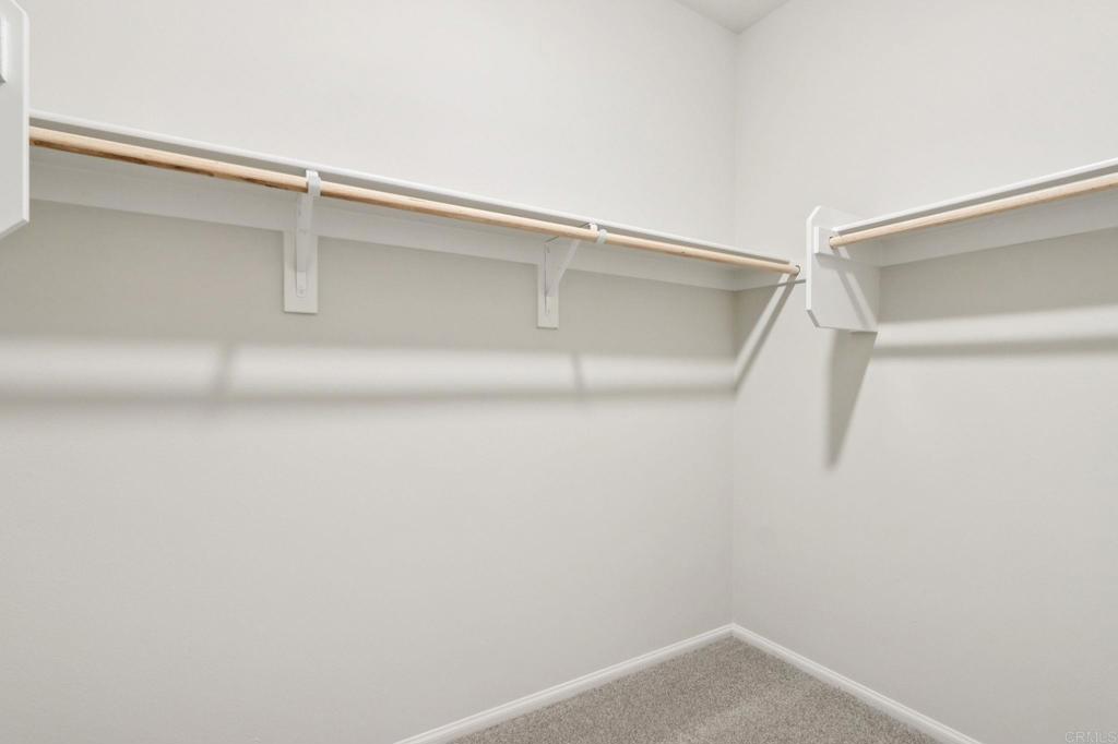 28424 Campos De Flores Temecula, CA 92591 - Photo 32 of 36 a view of an empty walk in closet