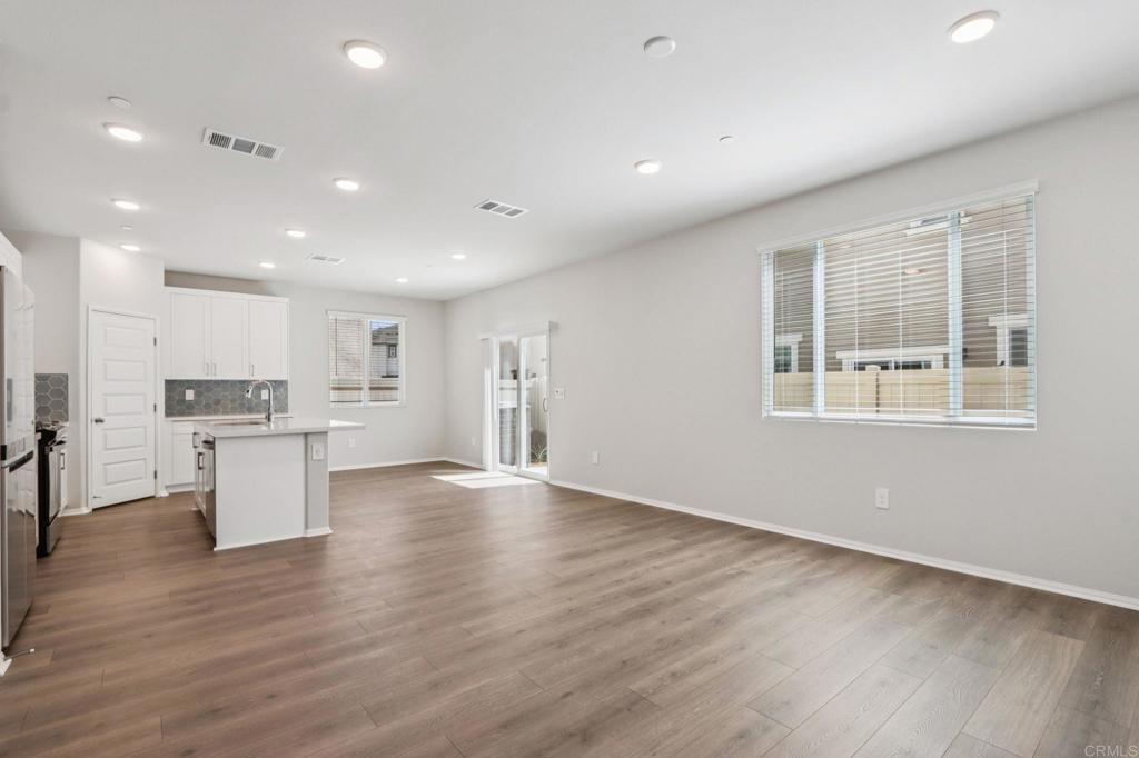 28424 Campos De Flores Temecula, CA 92591 - Photo 6 of 36 a view of kitchen with wooden floor