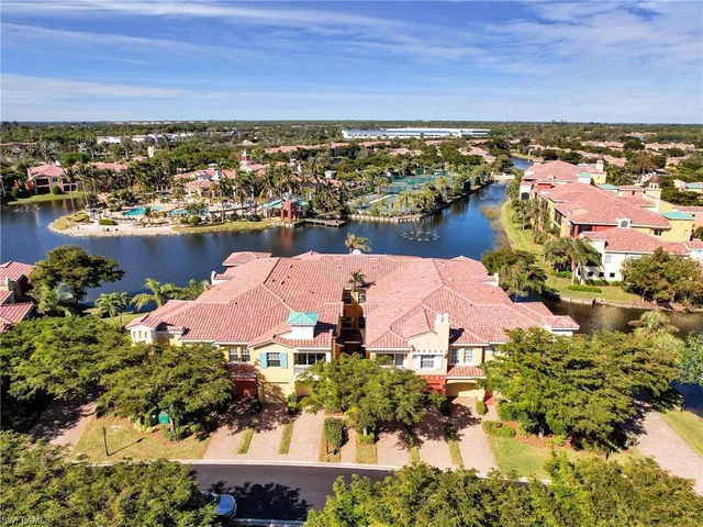 a small garden covered with tall trees