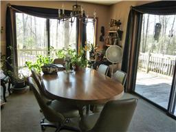 608 Eastbrook Road Estill Springs, TN 37330 - Photo 3 of 19 Large dining area with built in storage. Access to deck with beautiful lake view.