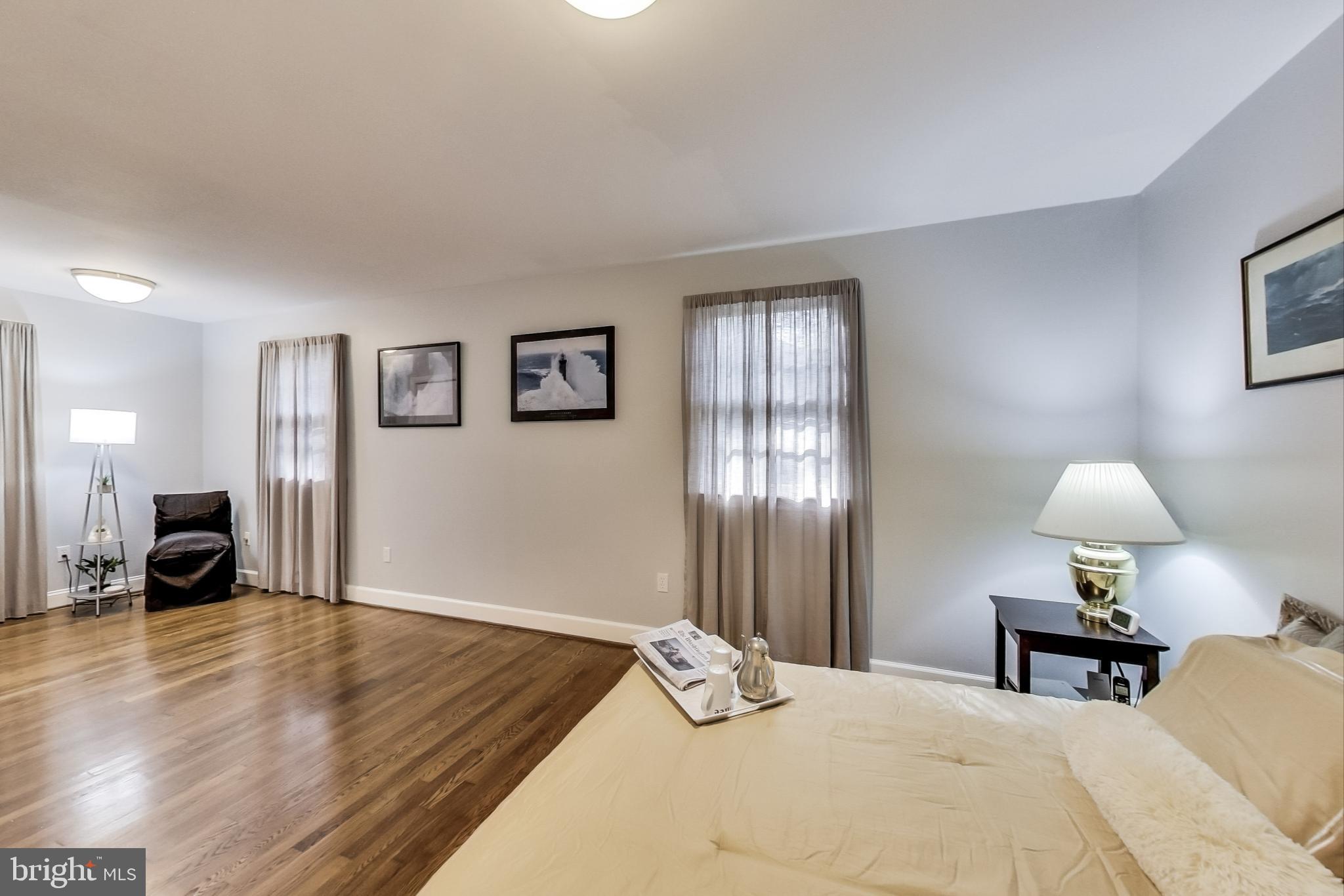 116 Northway Road Greenbelt, MD 20770 - Photo 15 of 46 Master Bedroom view w/ 4 sets of windows