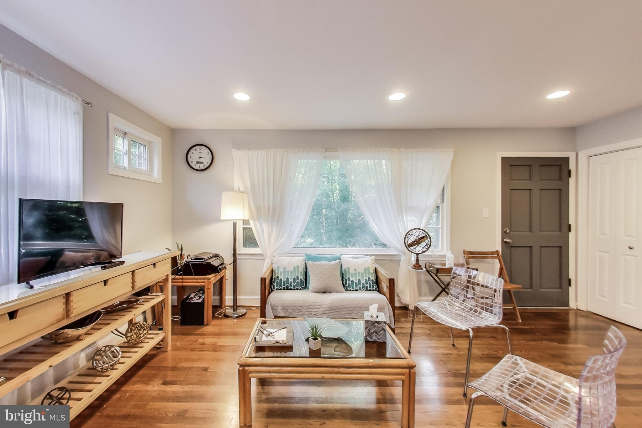 116 Northway Road Greenbelt, MD 20770 - Photo 5 of 46 Living Room with view of back door and yard