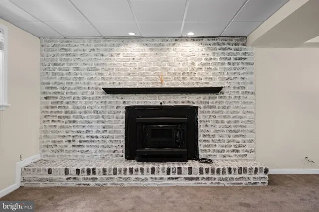 a brick oven with a fireplace in it