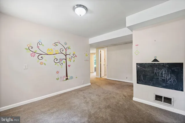 a view of an empty room with window