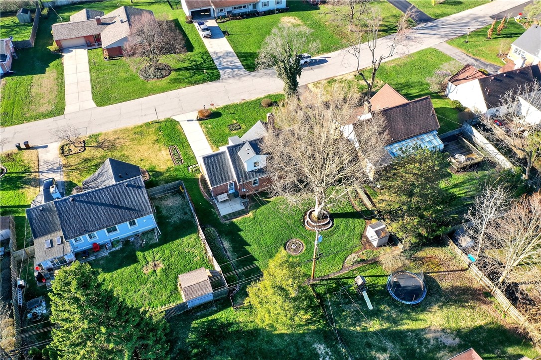 1237 Laurelwood Road Dayton, OH 45409 - Photo 50 of 56 An aerial view captures the verdant landscaping of a residential neighborhood.