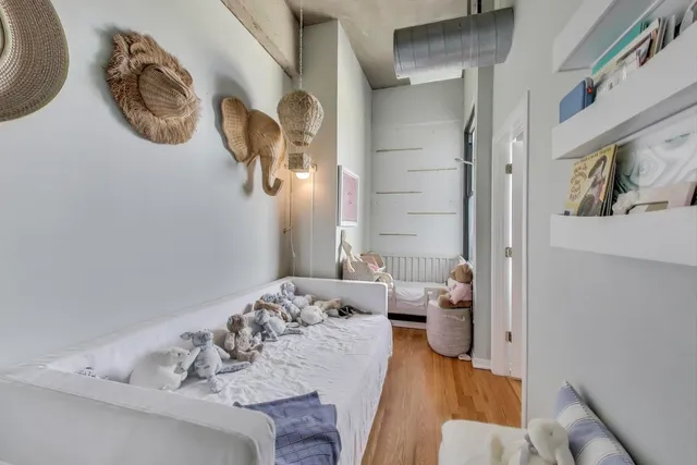 a bedroom with a bed and bathroom