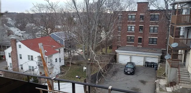 a view of multiple house with outdoor seating