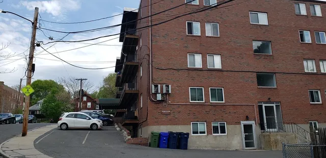a car parked in front of a building