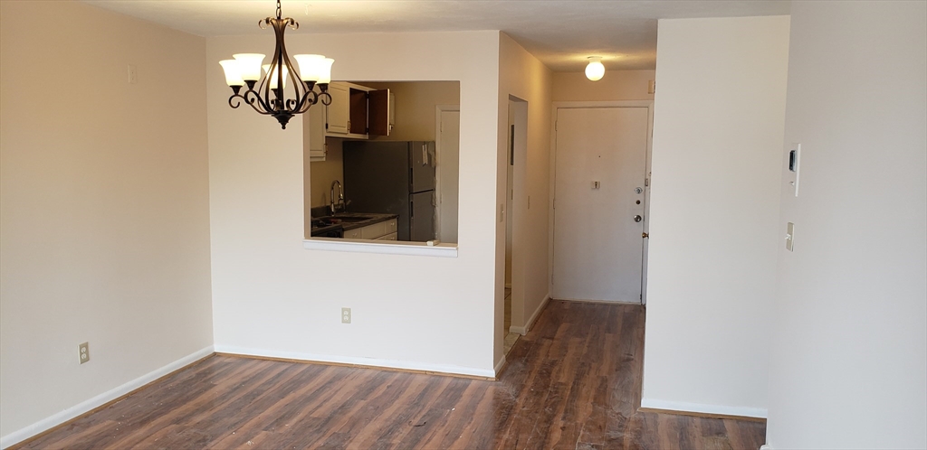 6 Hayes Road, Unit 25 Boston, MA 02131 - Photo 30 of 39 a view of a room with wooden floor