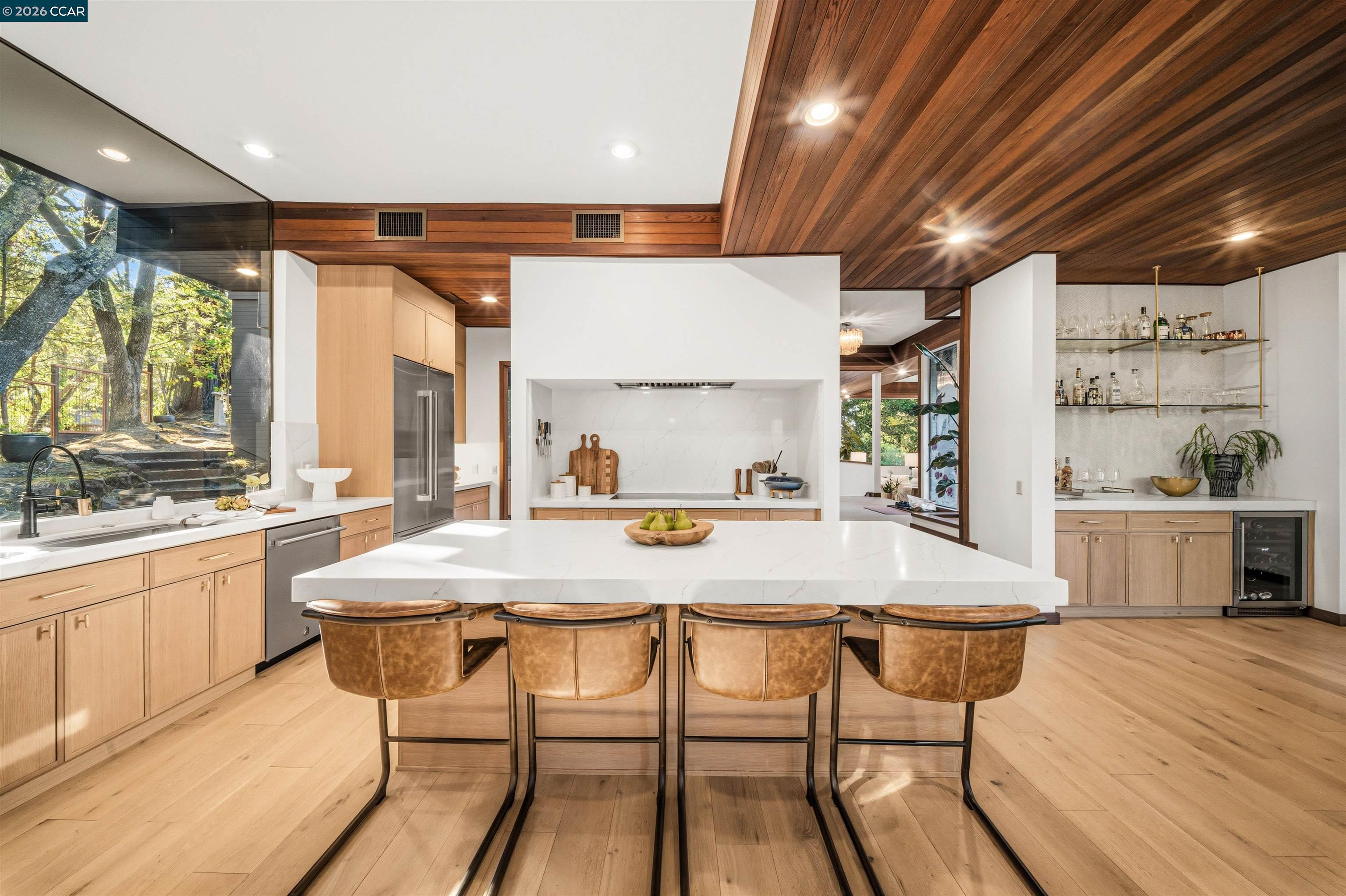 841 Kirkcrest Road Alamo, CA 94507 - Photo 18 of 62 a kitchen with stainless steel appliances granite countertop a kitchen island wooden cabinets and island