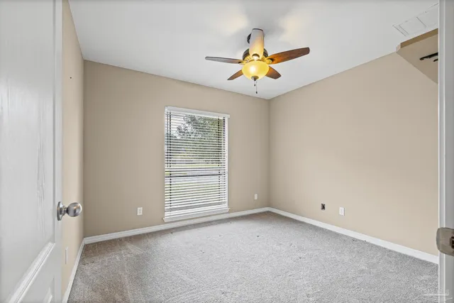 a view of livingroom with hardwood floor and hallway