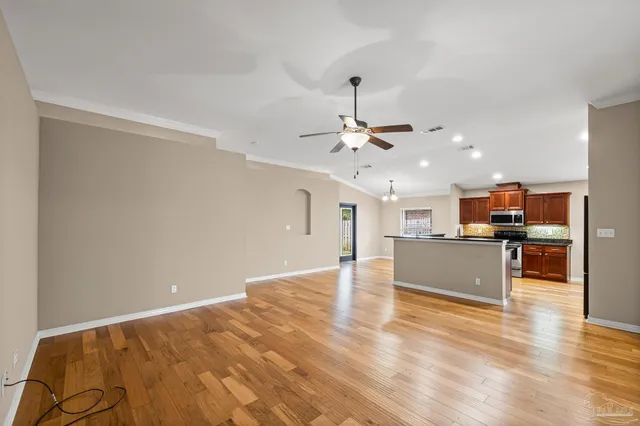 a kitchen with a stove and a sink