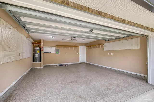 a bathroom with a granite countertop sink double and mirror