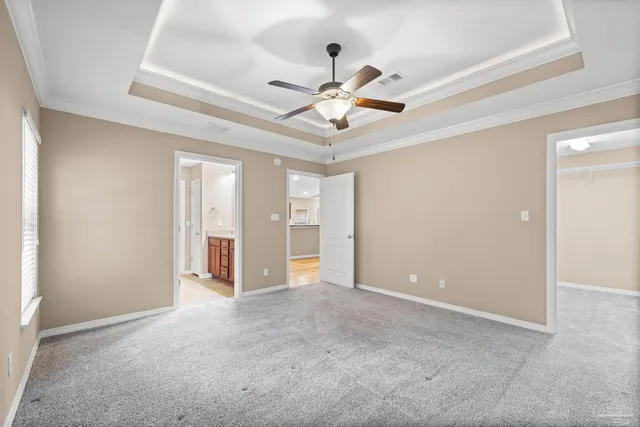 a view of a backyard with sitting area